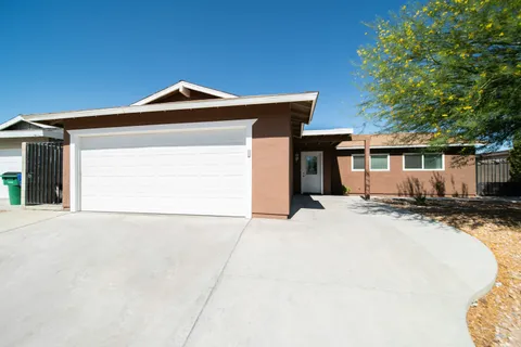 House with an attached garage along the driveway